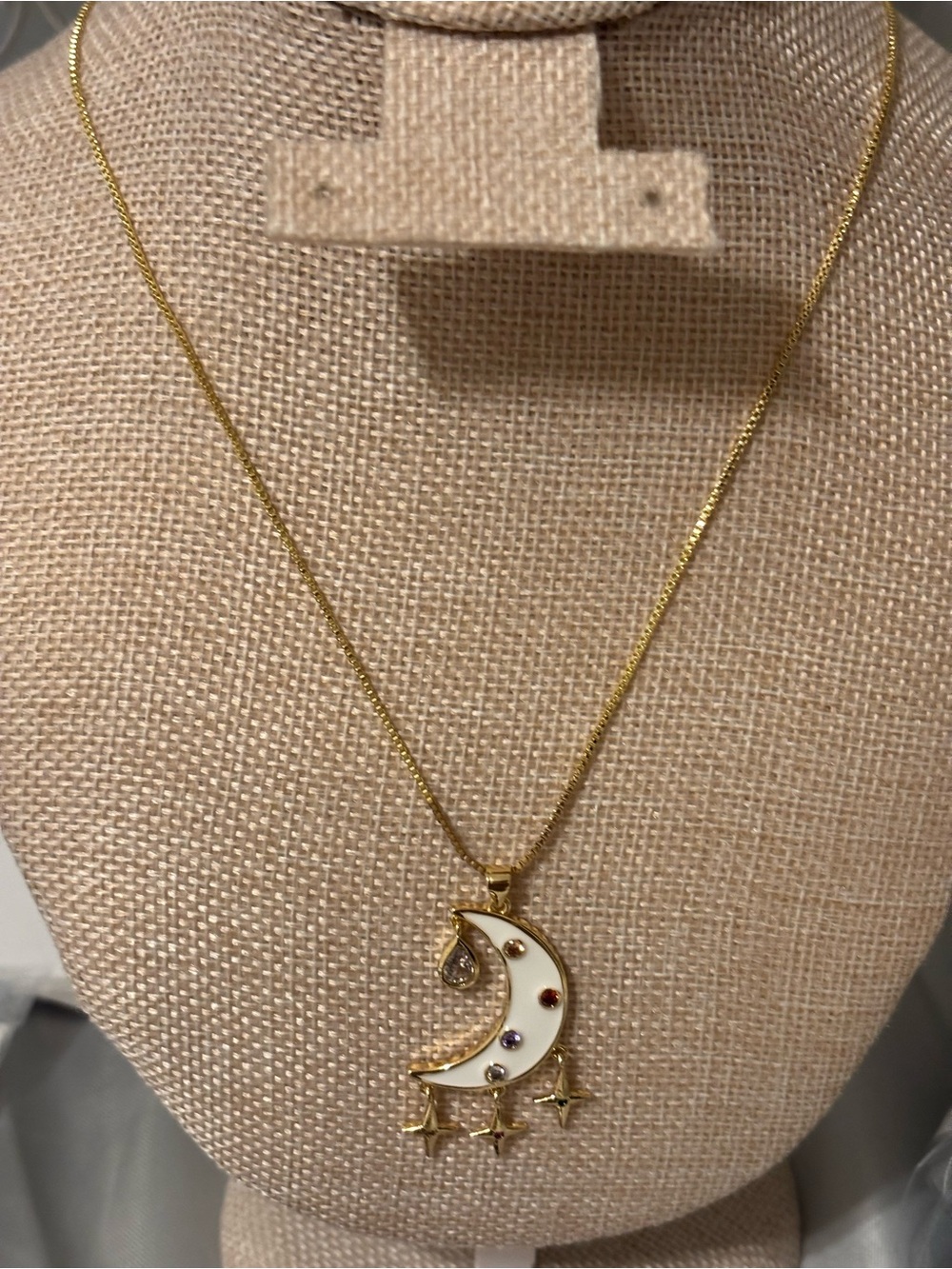 Gold-Tone Crescent Moon Pendant Necklace with White Enamel and Multicolor Stones